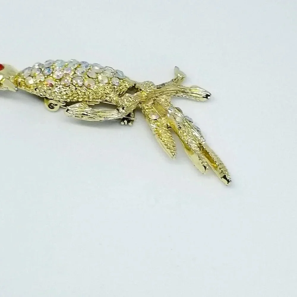 Clear Aurora Borealis Rhinestone Red Eyed Bird Pin